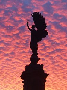 a statue of a woman holding a branch view of letting a property